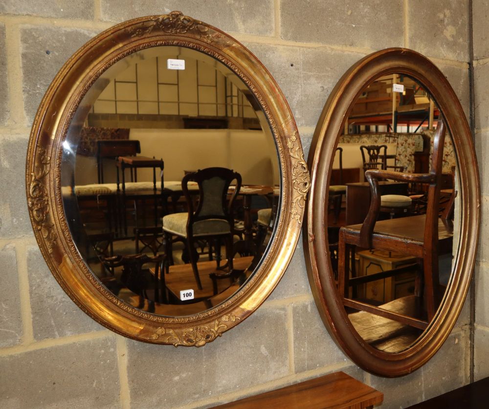 Two gilt-framed oval wall mirrors, larger 70 x 100cm